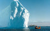 Antarctica - Lemaire channel (off Bismark strait, between Booth Island and the Antarctic Peninsula): Zodiac, the ship and the iceberg - photo by G.Frysinger