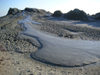 Azerbaijan - Gobustan / Qobustan / Kobustan - Qobustan Rayonu: mud volcano - spilling mud - photo by Austin Kilroy