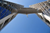 Manama, Bahrain: Bahrain World Trade Center - BWTC - seen from below - the towers are linked via three skybridges, each holding a 225 kW wind turbine - green architecture, collaboration between Atkins architects and engineers and turbine specialists Norwin - photo by M.Torres