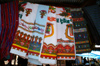 Bhutan - Thimphu - the market - textiles with Buddhist motives - photo by A.Ferrari