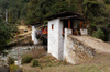 Bhutan - prayer flags and covered bridge spanning the Wang Chhu - photo by A.Ferrari