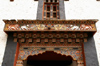 Bhutan - wood carvings above a gate - Trongsa Dzong - photo by A.Ferrari