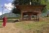 Bhutan, Punakha, Monks and large outdoor prayer wheel - photo by J.Pemberton