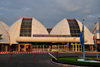 Bujumbura, Burundi: Bujumbura International Airport - BJM - landside - the building resembles a set of rugo traditional huts - photo by M.Torres