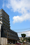 Cameroon, Douala: badly preserved concrete tower downtown, hosting a TV station - photo by M.Torres