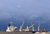 Cameroon, Douala: harbor scene - freighter ship and port warehouses - Douala harbor handles most of the country's imports and exports - Cosco Singapore - photo by M.Torres