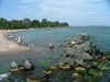 Toronto, Ontario, Canada / Kanada: beach and cairn - Centre Island - photo by R.Grove