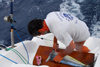 Brava island - Cape Verde / Cabo Verde: at sea - preparing Atlantic ocean fish - photo by E.Petitalot