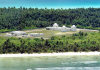 Diego Garcia - NKW, Chagos islands: beach and the Ground-Based Electro-Optical Deep Space Surveillance System (GEODSS) facility - tracking man-made deep space objects in orbit around earth - photo by USAF /Senior Master Sgt. John Rohrer