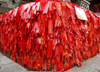 China - Mt. Taishan: inside a Buddhist temple - each red ribbon represents a wish (photo by G.Friedman)