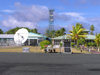 Cocos islands / Keeling islands / XKK - West Island - atoll: airport facilities - radio mast and satellite dish - communications - photo by Air West Coast