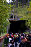 Zipaquir, department of Cundinamarca, Colombia: pilgrims at the main entrance to the Salt Cathedral of Zipaquir - Catedral de Sal de Zipaquir - photo by E.Estrada