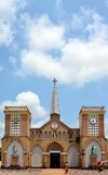 Brazzaville, Congo: women leave the Cathedral of the Sacred Heart under the african sun - Cathdrale du Sacr Cur / Cathdrale Saint Firmin (1892) - designed by Monseigneur Augouard - Quartier de l'Aiglon - photo by M.Torres