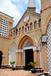 Brazzaville, Congo: main gate of the Cathedral of the Sacred Heart, with plant pots - blind arcade with Jesus - Cathdrale du Sacr Cur / Cathdrale Saint Firmin (1892) - designed by Monseigneur Augouard - Quartier de l'Aiglon - photo by M.Torres