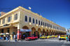 San Salvador, El Salvador, Central America: Parque Libertad, former Plaza de Armas - the arcade - 'los portales' commercial arcade - photo by M.Torres