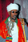 Lalibela, Amhara region, Ethiopia: Bet Medhane Alem rock-hewn church - prist wearing a turban - photo by M.Torres