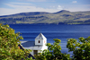 Kirkjubur, Streymoy island, Faroes: Olavskirkjan - Saint Olav's church - Hestsfjrdur and Hestur island in the background - photo by A.Ferrari