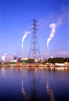 Le Havre, Seine-Maritime, Haute-Normandie, France: Paint Chemical Industry - smoke stacks and electrical pylon - photo by A.Bartel