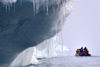 42 Franz Josef Land: Iceberg with icicles and zodiac - photo by B.Cain