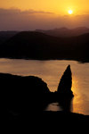 Bartolom Island, Galapagos Islands, Ecuador: Pinnacle Rock and the sea at sunset - photo by C.Lovell