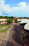 Banjul, The Gambia: view along Independence drive, the capital's tree-lined main avenue and skyline of the low-rise Gambian capital with the military parades' stand in the foreground - photo by M.Torres