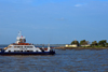 Barra, The Gambia: the ferryboat from Banjul - the Kanilai completes the crossing of the River Gambia estuary, approaching Fort Bullen - photo by M.Torres