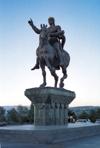 Georgia - Tbilisi / Tblissi / TBS: equestrian statue of Davit the builder in front of the Iveria hotel - photo by M.Torres