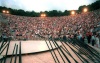 Greece - Epidauros / Epidaurus: 3rd-century theatre, 21st-century audience - Unesco world heritage site - photo by N.Axelis