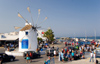 Greece - Paros: thatched roof windmill by the harbour - Paroikia - photo by D.Smith