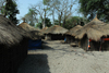 Rubane Island, Bijags Archipelago - UNESCO biosphere reserve, Bubaque sector, Bolama region, Guinea Bissau / Guin Bissau: native village, wooden houses with thatched roofs, everyday life / aldeia, cubatas de madeira e palha, vida quotidiana - tabanca -  photo by R.V.Lopes