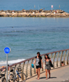 Tel Aviv, Israel: girls on the boardwalk - bike lane - photo by M.Torres