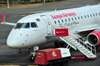 Nairobi, Kenya: Jomo Kenyatta International Airport - Kenya Airways Embraer 170, 5Y-KYH and Houchin 140kVA Ground Power Unit - photo by M.Torres