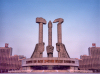 North Korea / DPRK - Pyongyang / FNJ: Monument to Party Foundation - hands holding a hammer, a hoe and a brush - Korean Workers' Party symbol - Munsu Street - photo by M.Torres