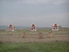 Kosovo: three little houses - photo by A.Kilroy