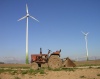 Latvia - Liepajas rajons: tractor and windfarm (Kurzeme) - photo by A.Dnieprowsky