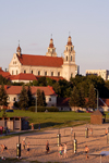 Lithuania - Vilnius: Beach volleyball near river Neris - Church of St. Raphael the Archangel - photo by Sandia