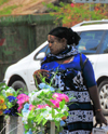 Mamoudzou, Grande-Terre / Mahore, Mayotte: woman with m'zinzano facial mask - beauty treatment of the Comoros, Mozambique and Madagascar - photo by M.Torres