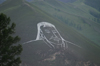 Ulan Bator / Ulaanbaatar, Mongolia: face of Genghis Khan / Chinggis Khaan on a hill - photo by A.Ferrari