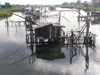 Montenegro - Crna Gora - Bojana river / river Buna: traditional fishing nets and fishing huts - border with Albania - Ulcinj municipality - photo by J.Kaman