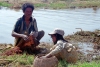 Myanmar / Burma - Inle Lake: lone fisherman with child - photo by J.Kaman