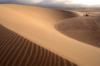 Namibia: Sweeping sand dunewith land rover, Skeleton Coast - photo by B.Cain