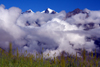 Annapurna region, Nepal: peaks, clouds and grass - view form Jharkot, Mustang district - photo by M.Wright