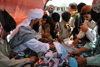 Taftan, Balochistan, Pakistan: men inspect goods in the bazaar - photo by A.Slobodianik