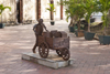 Panama City / Ciudad de Panama: street sculpture near Panama's National Culture Institute - cart- Plaza de Francia - Old Quarter - photo by H.Olarte