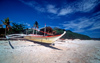 Philippines - Beach - local catamaran on white sand - photo by B.Henry