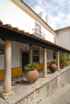 bidos, Portugal: house with porch and flower pots - Sta Maria square - casa com alpendre e vasos - Largo de Santa Maria - photo by M.Durruti