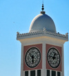 Doha, Qatar: the Clock Tower with Arabic numerals on its face - built by Darwish Engineering on a small promontory in 1956, together with the old Diwan al Amiri and Grand Mosque - photo by M.Torres