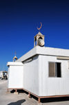 Doha, Qatar: a container becomes a modest mosque - crescent and bullhorns - Dhow harbour - photo by M.Torres