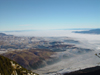 Romania - Piatra Craiului: Brasov under the clouds - photo by R.Ovidiu