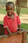 Rwanda: inquisitive boy in the back of a truck - photo by J.Banks